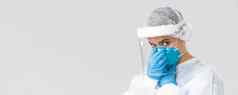 科维德防止病毒健康医疗保健工人检疫概念年轻的医生战斗冠状病毒工作生病的病人个人保护设备应用脸面具呼吸器
