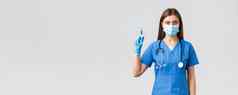 科维德防止病毒健康医疗保健工人检疫概念女护士蓝色的实习医生风云医生穿医疗面具持有注射器冠状病毒疫苗
