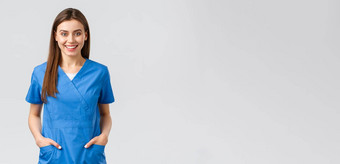 医疗保健工人防止病毒保险医学概念快乐的微笑美丽的医生女护士蓝色的实习医生风云实习生医院住积极的站灰色背景