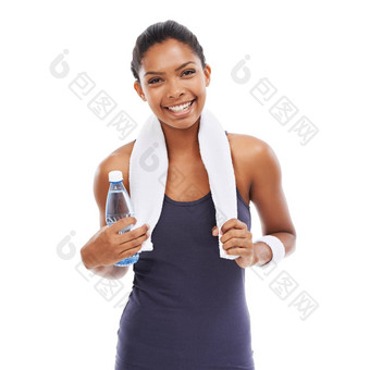 健身房部分每天例程年轻的女人持有瓶水激励锻炼