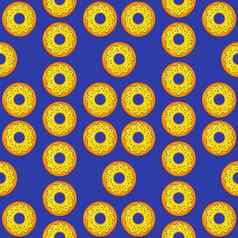 无缝的模式黄色的甜甜圈蓝色的背景糖果糖果前视图