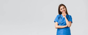 医疗工人医疗保健科维德疫苗接种概念乐观的微笑漂亮的护士医生蓝色的实习医生风云工作诊所热情的加沙相机听同事
