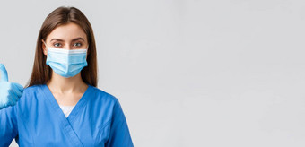 科维德防止病毒健康医疗保健工人检疫概念自信支持女护士医生蓝色的实习医生风云医疗面具竖起大拇指批准推荐