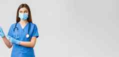 科维德防止病毒健康医疗保健工人检疫概念医生女护士医疗面具蓝色的实习医生风云指出左横幅冠状病毒信息
