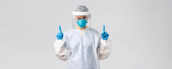 科维德防止病毒健康医疗保健工人检疫概念持怀疑态度怀疑医生护士个人保护设备医疗西装脸盾指出