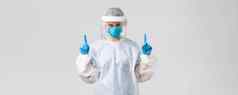 科维德防止病毒健康医疗保健工人检疫概念确定年轻的医生护士工作病人生病的冠状病毒指出手指穿保护西装