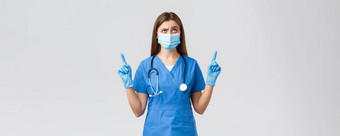 科维德防止病毒健康医疗保健工人检疫概念持怀疑态度可疑的女护士蓝色的实习医生风云听诊器医疗面具指出手指