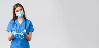 科维德防止病毒健康医疗保健工人检疫概念有吸引力的女护士蓝色的实习医生风云个人保护设备给医疗面具病人
