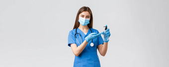 科维德防止病毒医疗保健工人检疫概念漂亮的女护士医生蓝色的实习医生风云手套医疗面具应用手洗手液保护冠状病毒