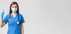 科维德防止病毒健康医疗保健工人检疫概念女护士蓝色的实习医生风云医生穿医疗面具持有注射器冠状病毒疫苗