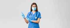 科维德防止病毒健康医疗保健工人检疫概念感兴趣质疑女医生护士蓝色的实习医生风云医疗面具问题指出左