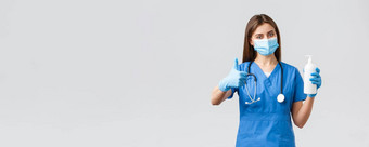 科维德防止病毒健康医疗保健工人检疫概念自信女医生护士蓝色的实习医生风云医疗面具实习医生风云建议手洗手液竖起大拇指批准