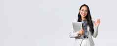 业务金融就业女成功的企业家概念友好的微笑办公室经理问候同事女商人客户手波持有移动PC