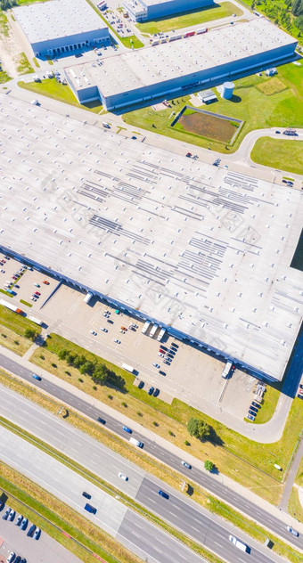 空中视图货物仓库物流中心工业城市区空中视图卡车加载物流中心股票照片