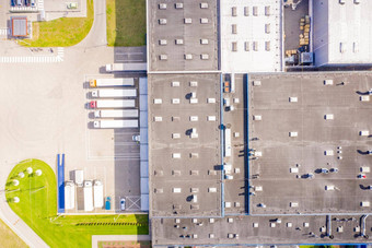 空中视图仓库存储工业工厂物流中心空中视图工业建筑设备机器日落健美的