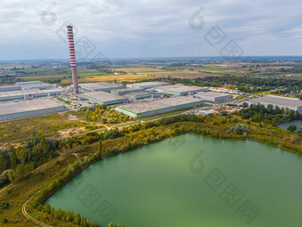 空中视图货物仓库物流交付中心工业城市区空中视图卡车加载物流中心视图无人机