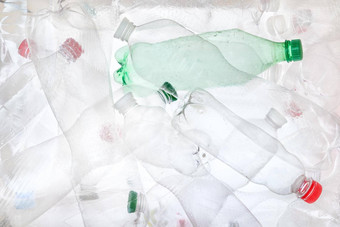 空塑料瓶背景水宠物瓶回收塑料材料可回收的浪费排序可回收的垃圾回收垃圾概念瓶透明的塑料宠物回收浪费