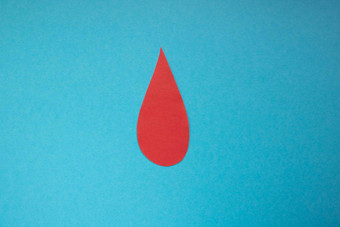 概念世界血捐赠血友病一天红色的纸下降血蓝色的背景