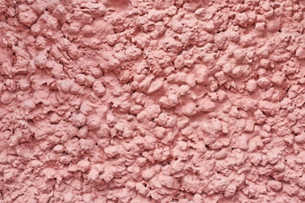 粉红色的摘要背景墙装饰石膏纹理