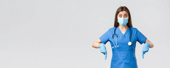 科维德防止病毒健康医疗保健工人检疫概念兴奋感兴趣女医生护士蓝色的实习医生风云医疗面具指出手指感兴趣