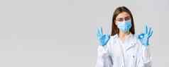 科维德防止病毒健康医疗保健工人检疫概念专业医生医生个人保护设备医疗面具手套显示标志保证