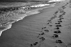 的足迹海滩足迹人类脚沙子海