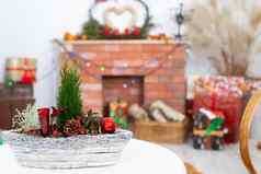 前面相机圣诞节里德提醒正在进行的圣诞节季节背景壁炉礼物