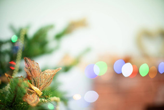 金时尚挂起节日圣诞节树装饰圣诞节假期闪亮的圣诞节树灯背景