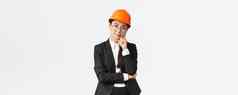 微笑专业亚洲女商人投资钱建设管理工作企业穿安全头盔西装很高兴相机站白色背景