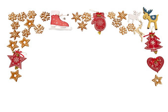 红色的圣诞节木平玩具点缀钟闪光姜饼行孤立的白色圣诞节卡红色的圣诞节木平玩具点缀钟闪光姜饼行孤立的白色圣诞节卡