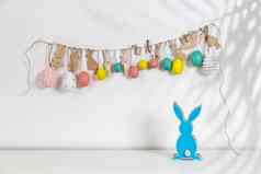 片段室内装饰孩子们的房间复活节加兰塑料鸡蛋野兔减少纸板墙木蓝色的兔子的地方文本复活节卡