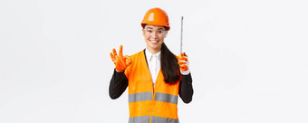 满意亚洲女建设工程师架构师检查员企业显示手势磁带测量微笑很高兴给许可批准测量有效的