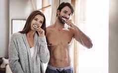 承诺健康牙齿拍摄年轻的夫妇刷牙牙齿首页