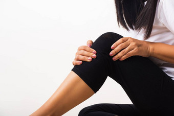 女人疼痛膝盖手联合持有膝盖痛苦
