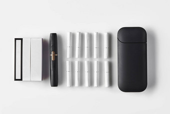 一代黑色的电子香烟电池包这加热棒孤立的白色技术加热烟草系统关闭