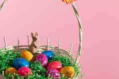 复活节篮子复活节鸡蛋棕色（的）兔子粉红色的背景