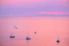 旅游游艇船爱琴海海圣托里尼岛岛游客看日落的观点圣托里尼岛希腊