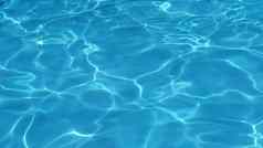 表面蓝色的游泳池夏天背景纹理水表面