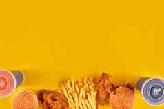 快食物菜黄色的背景快食物集炸鸡肉汉堡法国薯条快食物