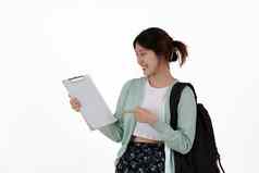 年轻的大学学生背包孤立的白色背景电子学习在线教育概念