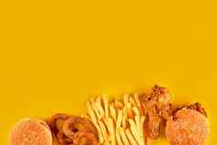 快食物菜黄色的背景快食物集炸鸡肉汉堡法国薯条快食物