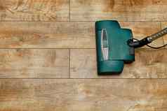 刷电真空更清洁的背景棕色（的）地板上木地板上董事会