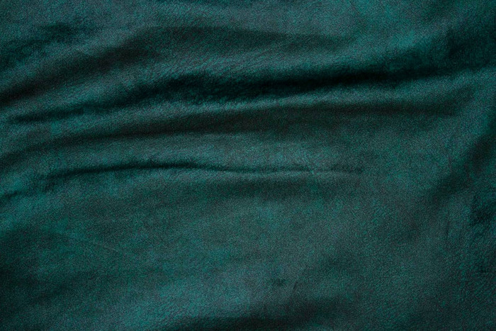 丝绒织物纹理背景绿色天鹅绒丝绒布背景发光图片-包图网企业站