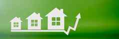 真正的房地产成本选择房子房子模型绿色背景概念保险购买真正的房地产信贷选择房子租公寓图箭头