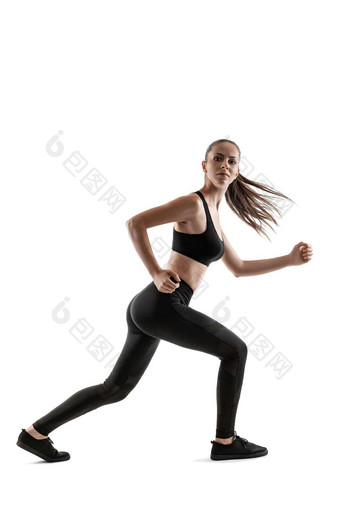 浅黑肤色的女人女人黑色的紧身裤前运动鞋摆姿势孤立的白色健身健身房健康的生活方式概念完整的长度