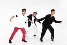 集团亚洲青少年少年跳舞嘻哈类孩子们享受跳舞快乐微笑有趣的孤立的白色背景