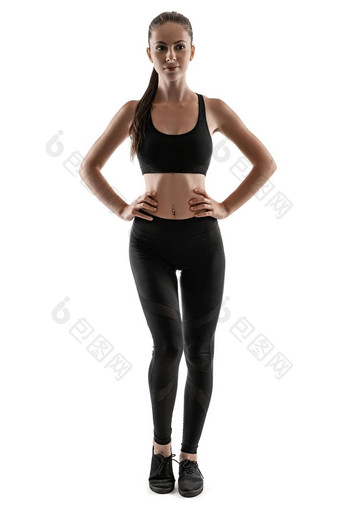 浅黑<strong>肤色</strong>的女人女人黑色的紧身裤前运动鞋摆姿势孤立的白色健身健身房<strong>健康</strong>的生活方式概念完整的长度