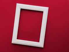 白色垂直艺术框架红色的背景平铺设计艺术作品打印照片专辑