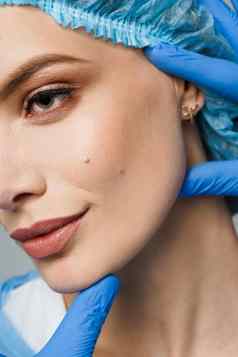 facebuilding咨询塑料外科医生白色背景化妆品振兴面部治疗