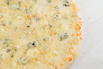 披萨奶酪帕尔玛硬奶酪渴望蓝色的马苏里拉奶酪孤立的白色木背景广告社会网络餐厅咖啡皇